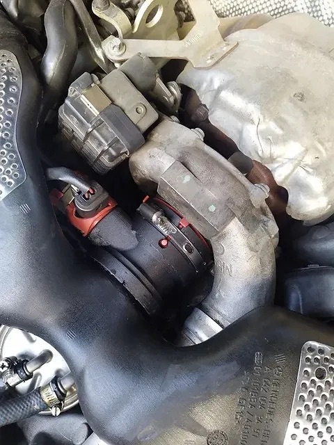 Completed N1013 repair fitted beside the turbocharger on a Mercedes OM642 engine